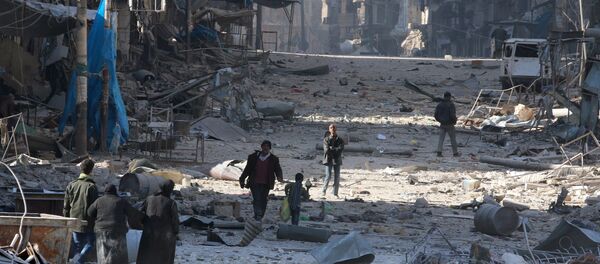 Halep'te çatışmalardan kaçan siviller - Sputnik Türkiye