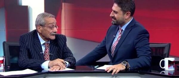 Mesut Mertcan - Erhan Çelik - Sputnik Türkiye