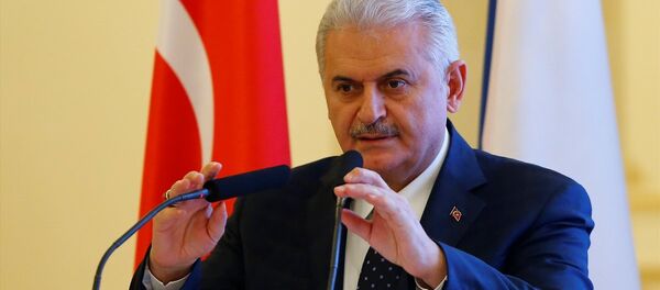 Başbakan Binali Yıldırım, Rusya'ya gerçekleştirdiği resmi ziyaretler kapsamında Tataristan Özerk Cumhuriyeti'nin başkenti Kazan'a geldi. Başbakan Yıldırım, Türk-Tatar İş Forumun'nda konuşma yaptı. - Sputnik Türkiye