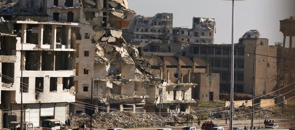 Militanlar ve siviller Halep'in doğusundan tahliye ediliyor - Sputnik Türkiye