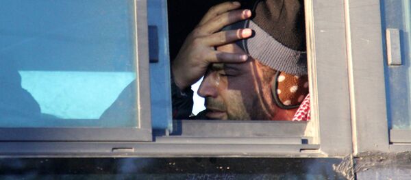 Halep'ten tahliye edilenler - Sputnik Türkiye