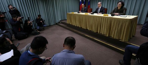 Tayvan Dışişleri Bakanı David Lee, Batı Afrika ülkesi Sao Tome'nin Tayvan ile diplomatik ilişkileri kesme kararının ardından basın açıklaması yaptı - Sputnik Türkiye