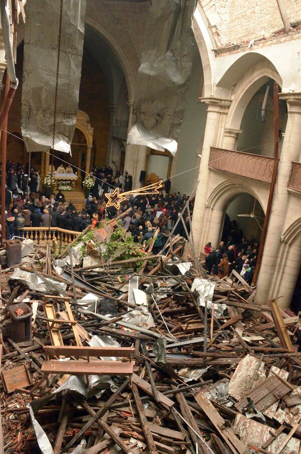 Eski Halep'teki Saint Elias Katolik Kilisesi'nde düzenlenen Noel töreni - Sputnik Türkiye