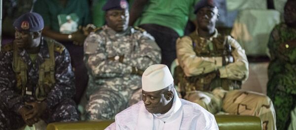 Incumbent Gambian President Yahya Jammeh looks on in Banjul on November 29, 2016, during the closing rally of the electoral campaign of the Alliance for Patriotic Reorientation and Construction (APRC) - Sputnik Türkiye