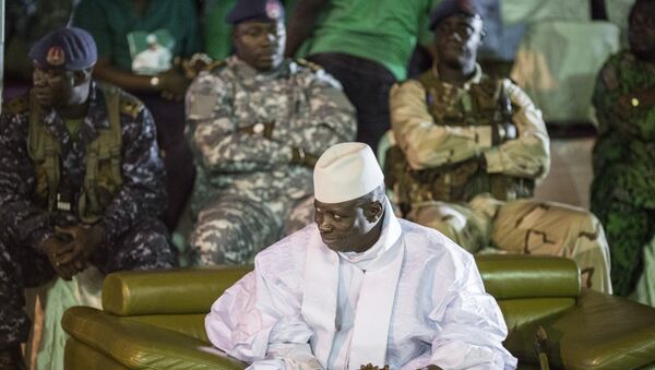 Incumbent Gambian President Yahya Jammeh looks on in Banjul on November 29, 2016, during the closing rally of the electoral campaign of the Alliance for Patriotic Reorientation and Construction (APRC) - Sputnik Türkiye