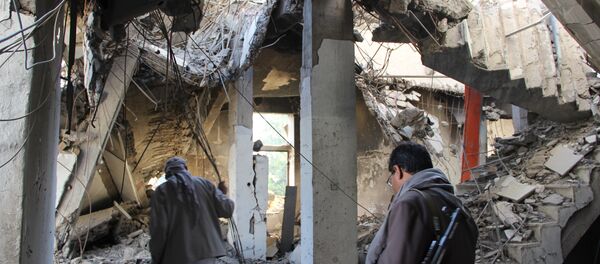 Yemen, Sada kenti yakınlarında bombalanan bina - Sputnik Türkiye