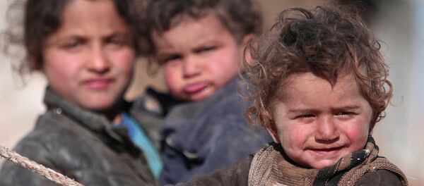 Rakka'dan kaçan Suriyeli çocuklar - Sputnik Türkiye