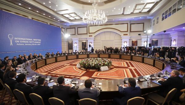 Delegations of Russia, Iran and Turkey hold talks on Syrian peace at a hotel in Astana, Kazakhstan, Monday, Jan. 23, 2017. - Sputnik Türkiye