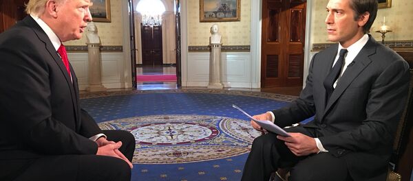 Trump başkan olduktan sonra ilk özel röportajını ABC'den David Muir'e verdi - Sputnik Türkiye