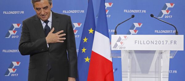 Francois Fillon, former French prime minister and member of Les Republicains political party, reacts as he delivers his speech after partial results in the second round for the French center-right presidential primary election in Paris, France, November 27, 2016. - Sputnik Türkiye