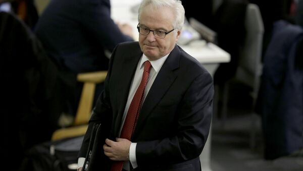 Russian ambassador to the United Nations Vitaly Churkin leaves the General assembly hall after a vote supporting the territorial integrity of Ukraine at United Nations headquarters, Thursday, March 27, 2014 - Sputnik Türkiye