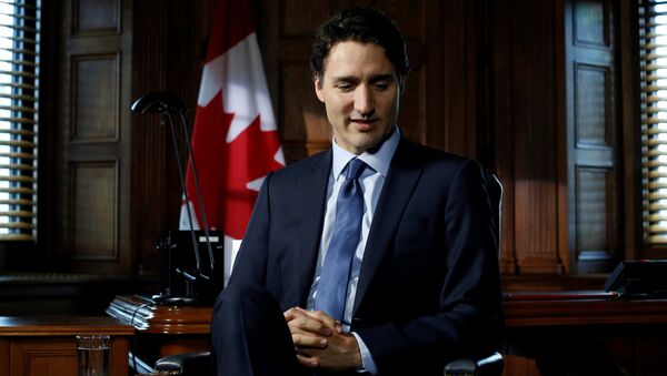 Canada's Prime Minister Justin Trudeau pauses before the start of an interview with Reuters on Parliament Hill in Ottawa, Ontario, Canada, May 19, 2016. - Sputnik Türkiye