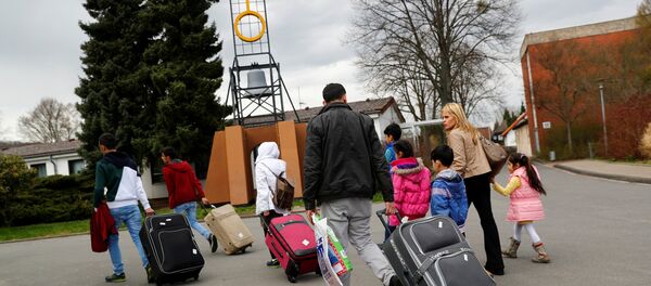 Almanya'da kampa yerleştirilen göçmenler - Sputnik Türkiye