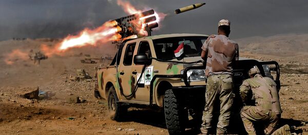 Musul'da IŞİD karşıtı operasyonda atılan bir füze. Musul'da IŞİD karşıtı operasyonda atılan bir füze. - Sputnik Türkiye