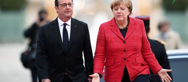 Fransa Cumhurbaşkanı François Hollande ve Almanya Başbakanı Angela Merkel - Sputnik Türkiye