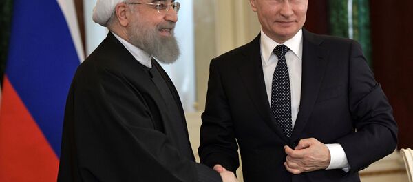 İran Cumhurbaşkanı Hasan Ruhani ve Rusya Devlet Başkanı Vladimir Putin - Sputnik Türkiye