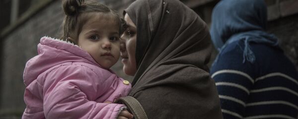 Almanya'nın İstanbul Başkonsolosluğu, Suriyelilerin vize başvurusu için ayrı bir bölüm oluşturmuş. Suriyeli sığınmacılar, burada vize başvurularını yapıyor. - Sputnik Türkiye