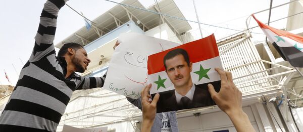 Şam'daki BM binası önünde ABD'yi protesto eylemi Şam'daki BM binası önünde ABD'yi protesto eylemi - Sputnik Türkiye