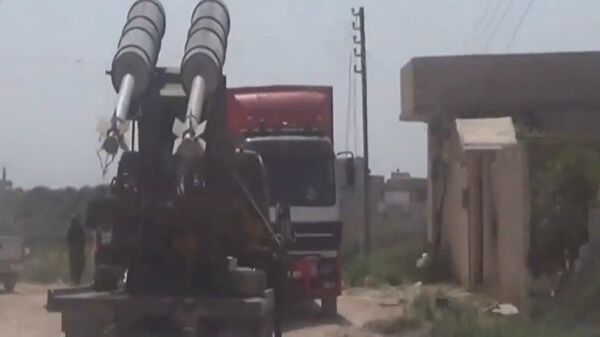 Suriye ordusu, Hama'daki Taybat al-Imam kentini ele geçirdi - Sputnik Türkiye
