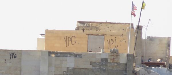 Türkiye sınırının karşısında bulunan YPG noktası - Sputnik Türkiye