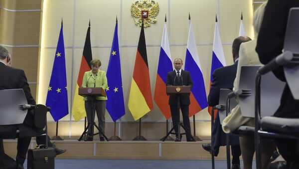 Angela Merkel - Vladimir Putin - Sputnik Türkiye
