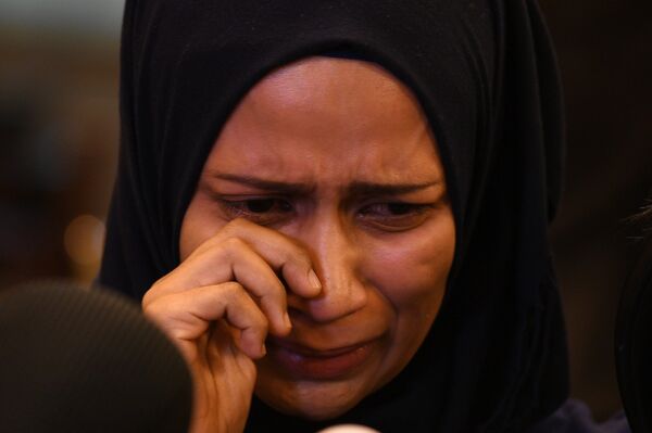 Malezya’da geçen hafta gözaltına alınan 3 Türk vatandaşından biri olan İhsan Aslan’ın Malezyalı eşi Ainnurul Aisyah Yunos - Sputnik Türkiye