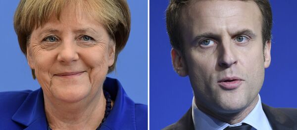 Almanya Başbakanı Angela Merkel ve Fransa Cumhurbaşkanı Emmanuel Macron - Sputnik Türkiye