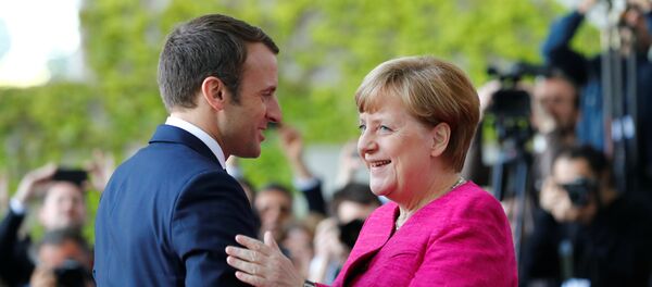 Fransa Cumhurbaşkanı Emmanuel Macron ve Almanya Başbakanı Angela Merkel - Sputnik Türkiye