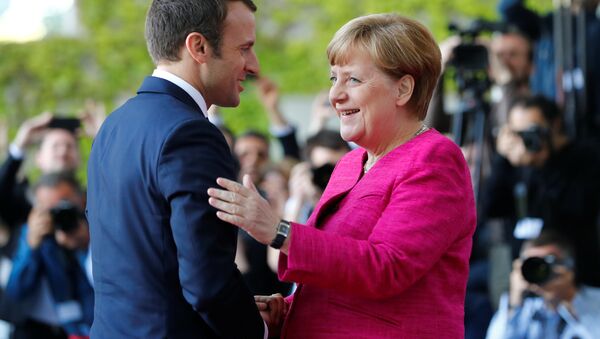 Fransa Cumhurbaşkanı Emmanuel Macron ve Almanya Başbakanı Angela Merkel - Sputnik Türkiye