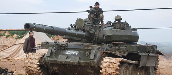 Syrian army troops during an assault on the city of Halfaya in the north of the Hama Governorate - Sputnik Türkiye