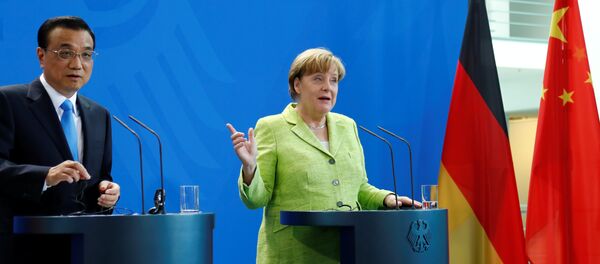 Angela Merkel - Li Keqiang - Sputnik Türkiye