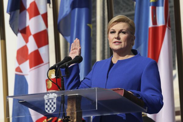 Kolinda Grabar-Kitarovic is sworn in during an inauguration ceremony in Zagreb, Croatia, Sunday, Feb. 15, 2015. - Sputnik Türkiye