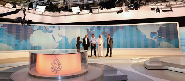 Al-Jazeera channel's newsroom in Doha Al-Jazeera channel's newsroom in Doha - Sputnik Türkiye