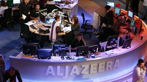 A general view shows the newsroom at the headquarters of the Qatar-based Al-Jazeera satellite channel in Doha - Sputnik Türkiye