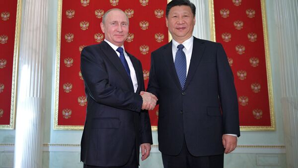Rusya Devlet Başkanı Vladimir Putin ile Çinli mevkidaşı Şi Cinping - Sputnik Türkiye