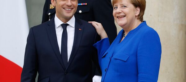 Fransa Cumhurbaşkanı Emmanuel Macron, Almanya Başbakanı Angela Merkel - Sputnik Türkiye