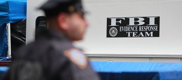 The search continues on a rainy Sunday at the site where New York police and FBI agents dig up a basement believed to contain clues to the unsolved disappearance 33 years ago of six-year-old Etan Patz in New York, April 21, 2012 - Sputnik Türkiye