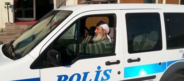 Polis memuru Kuraner Erbaş - Sputnik Türkiye