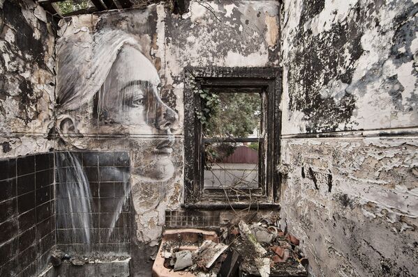 Terk edilmiş binalara çizilen resimler - Sputnik Türkiye