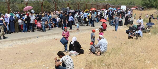 Suriyeli sığınmacılar, bayram için Kilis’in Öncüpınar Sınır Kapısı’nda Suriyeli sığınmacılar, bayram için Kilis’in Öncüpınar Sınır Kapısı’nda - Sputnik Türkiye