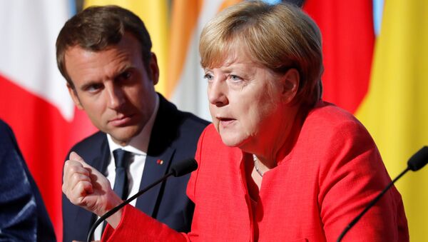 Fransa Cumhurbaşkanı Emmanuel Macron ve Almanya Başbakanı Angela Merkel - Sputnik Türkiye