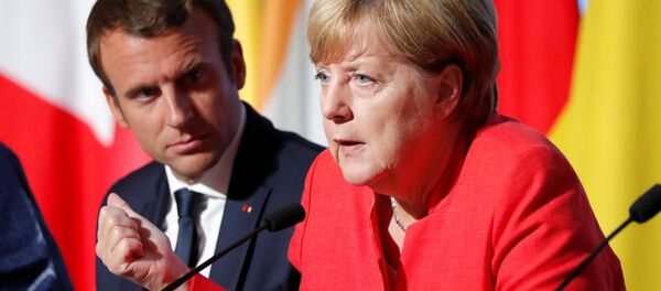 Fransa Cumhurbaşkanı Emmanuel Macron ve Almanya Başbakanı Angela Merkel - Sputnik Türkiye