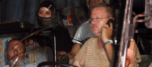 IŞİD mensupları ve ailelerini taşıyan konvoy IŞİD mensupları ve ailelerini taşıyan konvoy - Sputnik Türkiye