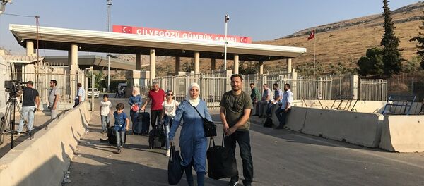 Suriyeli sığınmacıların bayram sonrası Türkiye'ye dönüşü sürüyor - Sputnik Türkiye