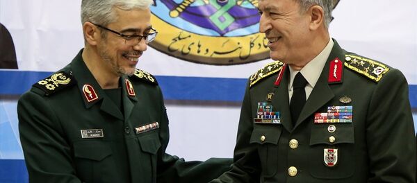Genelkurmay Başkanı Orgeneral Hulusi Akar, İranlı mevkidaşı Tuğgeneral Muhammed Bakiri - Sputnik Türkiye