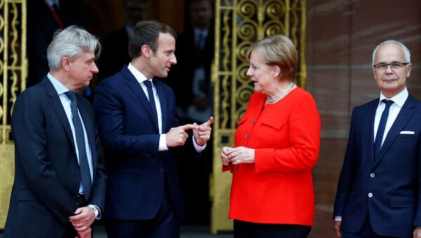 Fransa Cumhurbaşkanı Emmanuel Macron ile Almanya Başbakanı Angela Merkel - Sputnik Türkiye