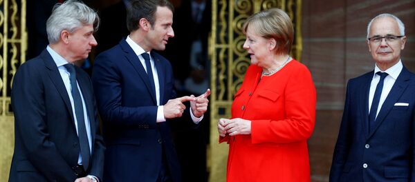 Fransa Cumhurbaşkanı Emmanuel Macron ile Almanya Başbakanı Angela Merkel - Sputnik Türkiye