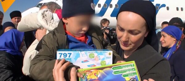 Irak'tan beş Rusyalı çocuk Grozni'ye getirildi - Sputnik Türkiye