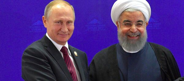 Rusya Devlet Başkanı Vladimir Putin ve İran Cumhurbaşkanı Hasan Ruhani - Sputnik Türkiye