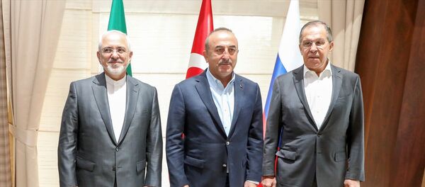 Dışişleri Bakanı Mevlüt Çavuşoğlu, Rusya Dışişleri Bakanı Sergey Lavrov ve İran Dışişleri Bakanı Muhammed Cevad Zarif - Sputnik Türkiye